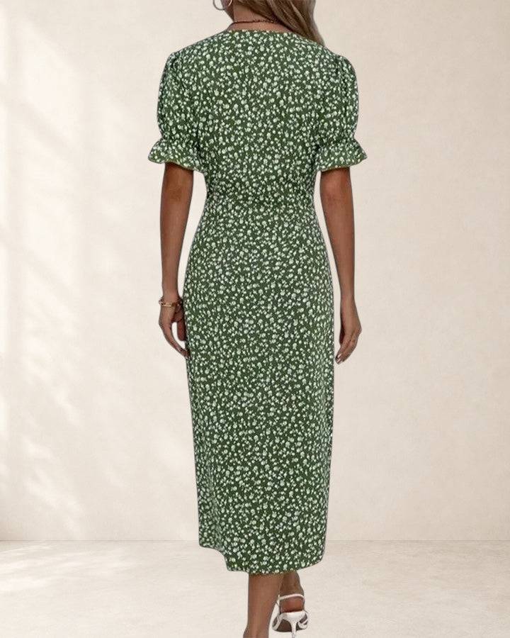 Kataryna summer dress by THE WHITMORE FAMILY, lightweight and comfortable, shown in a natural pose on a model.