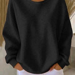 Cream-colored women's classic jumper sweater by THE WHITMORE FAMILY, showing a cozy knit design and round neckline.