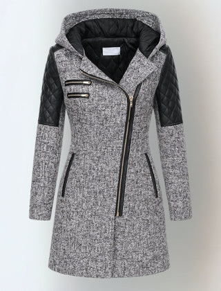 Katrin™ winter jacket by THE WHITMORE FAMILY, stylish and warm with a quilted design and cozy collar, suitable for cold weather.