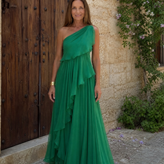 Talia cascading ruffle maxi dress by THE WHITMORE FAMILY, flowing fabric with layered ruching and elegant design.