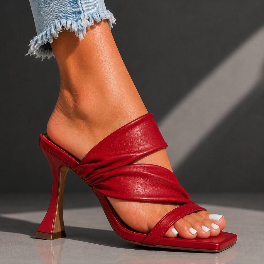 Serena Vale Strap Heels by The Whitmore Family featuring stylish ankle straps and a sleek design for elegant footwear.