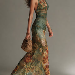 Shea floral maxi dress from THE WHITMORE FAMILY featuring a flowing silhouette and vibrant floral print.