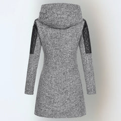 Katrin™ winter jacket by THE WHITMORE FAMILY, featuring a warm, elegant coat with a stylish hood and cozy insulation.