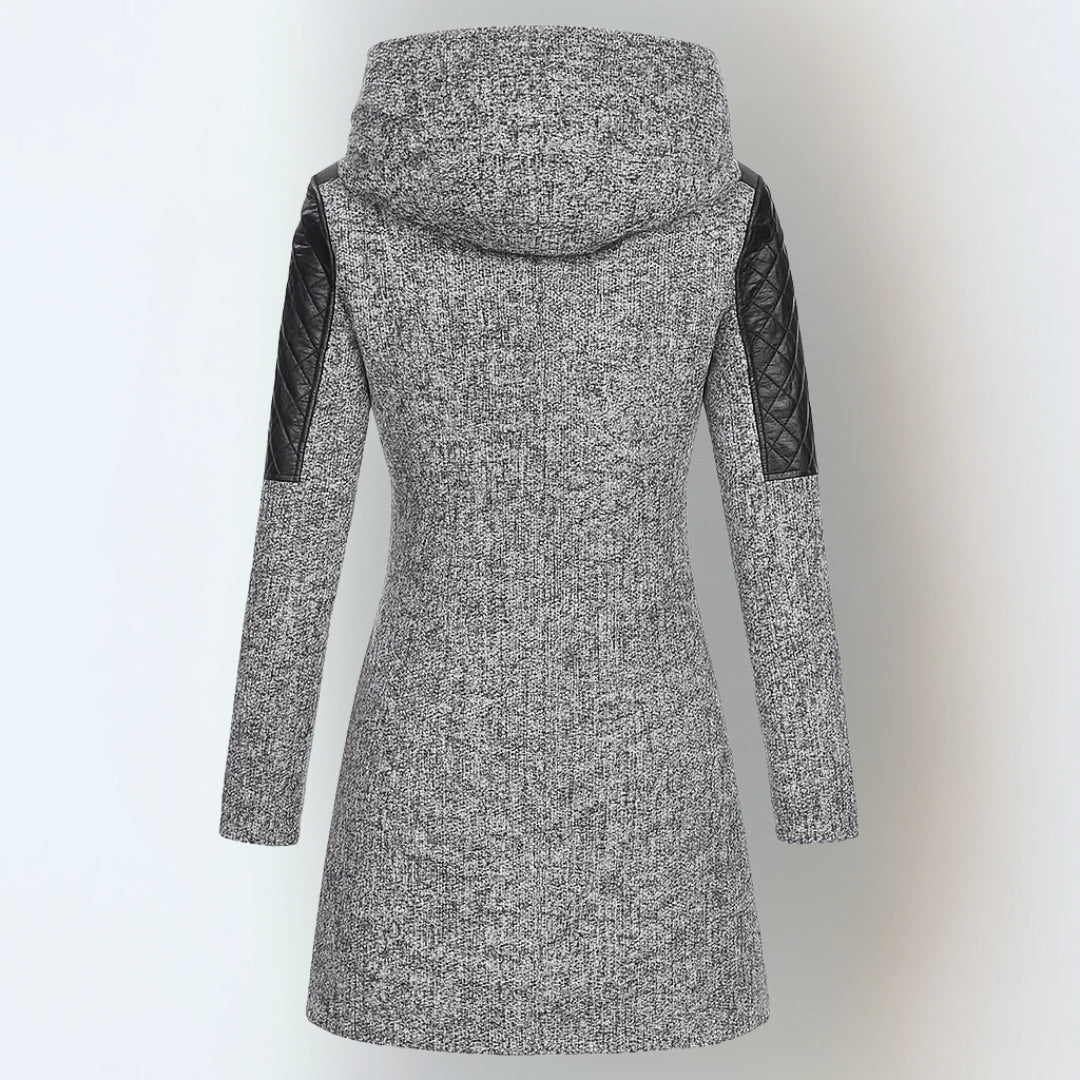 Katrin™ winter jacket by THE WHITMORE FAMILY, featuring a warm, elegant coat with a stylish hood and cozy insulation.