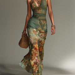 Shea floral maxi dress by THE WHITMORE FAMILY featuring a flowing fabric and vibrant floral pattern.