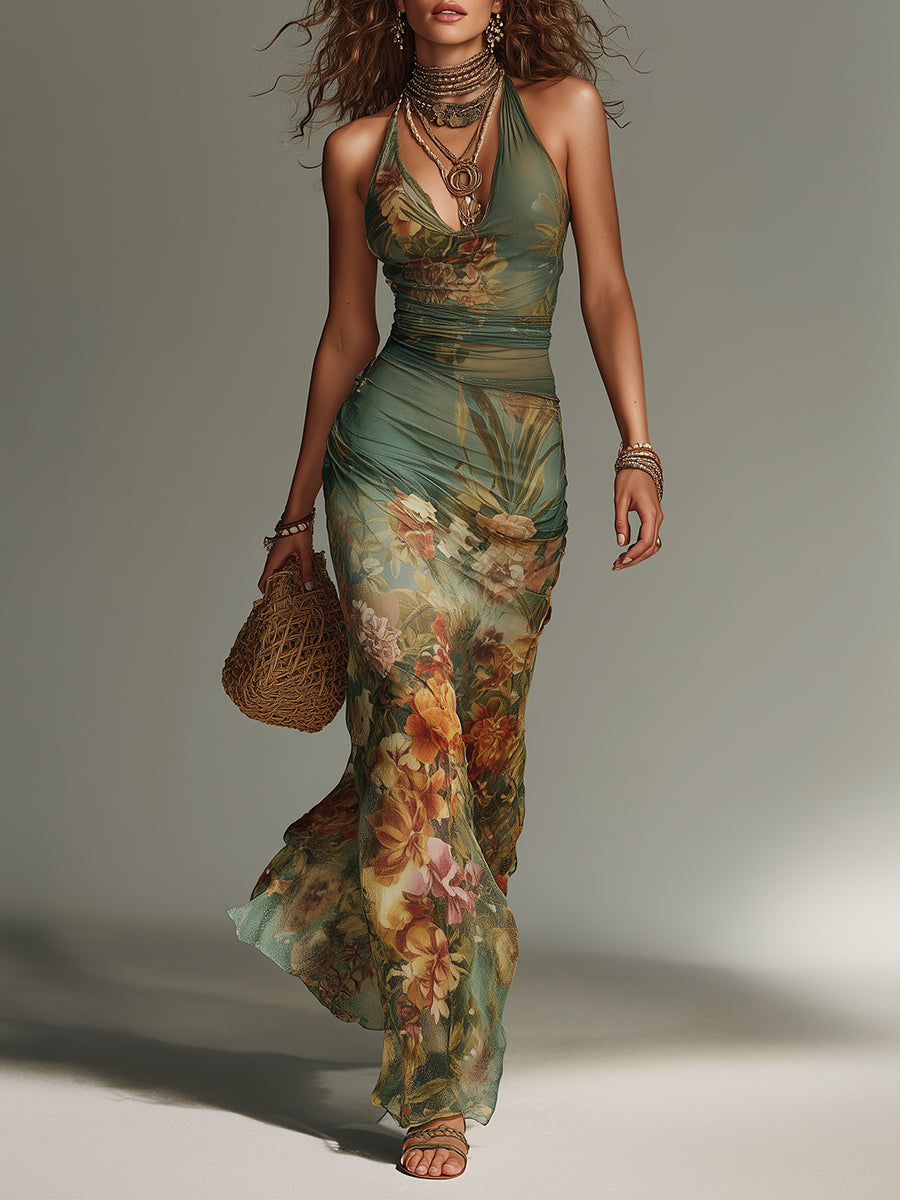 Shea floral maxi dress by THE WHITMORE FAMILY featuring a flowing fabric and vibrant floral pattern.