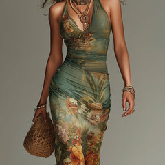 Shea floral maxi dress by THE WHITMORE FAMILY featuring a flowing silhouette and vibrant floral print.