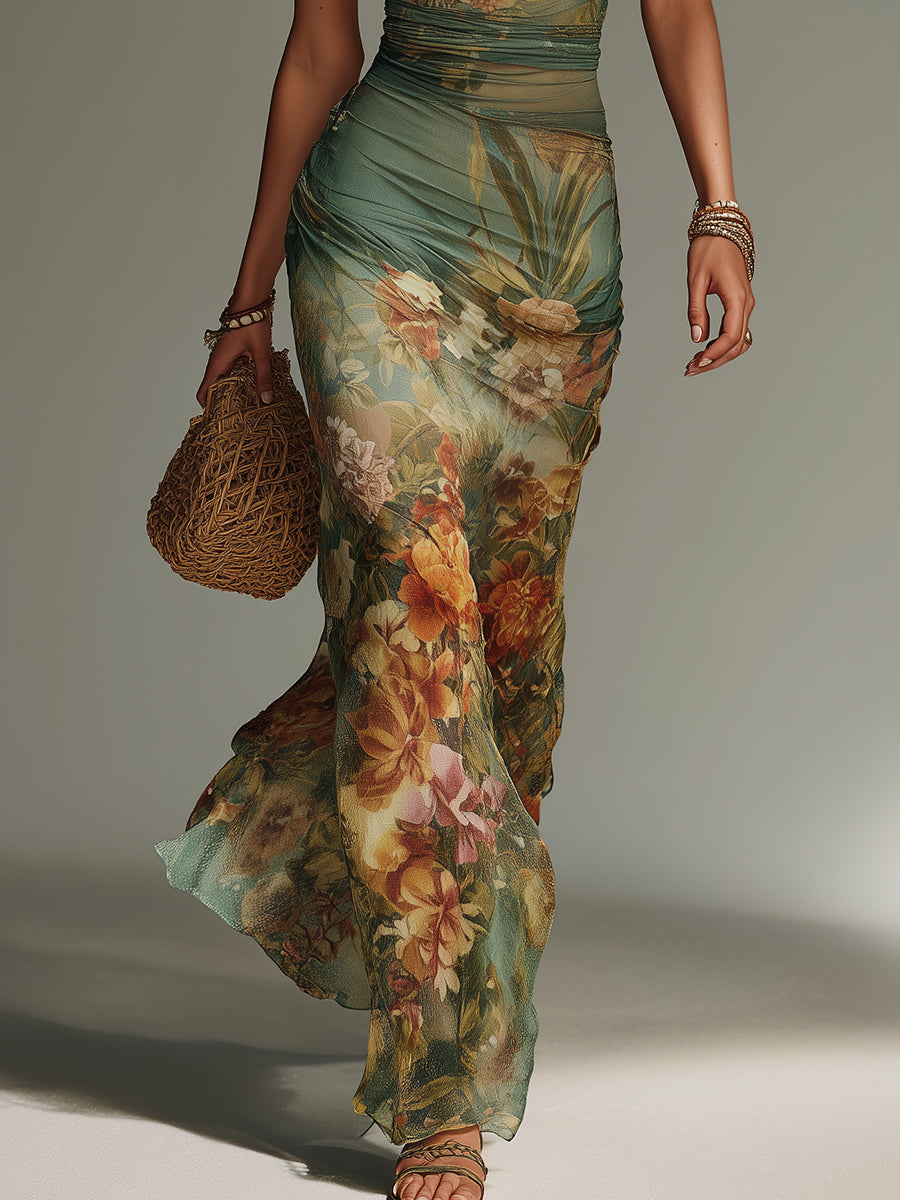 Shea floral maxi dress by THE WHITMORE FAMILY featuring a flowing silhouette and vibrant flower print.
