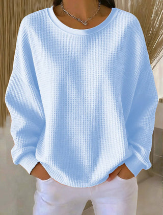 Women’s classic sweater jumper by THE WHITMORE FAMILY, featuring a cozy knit design and a relaxed fit.