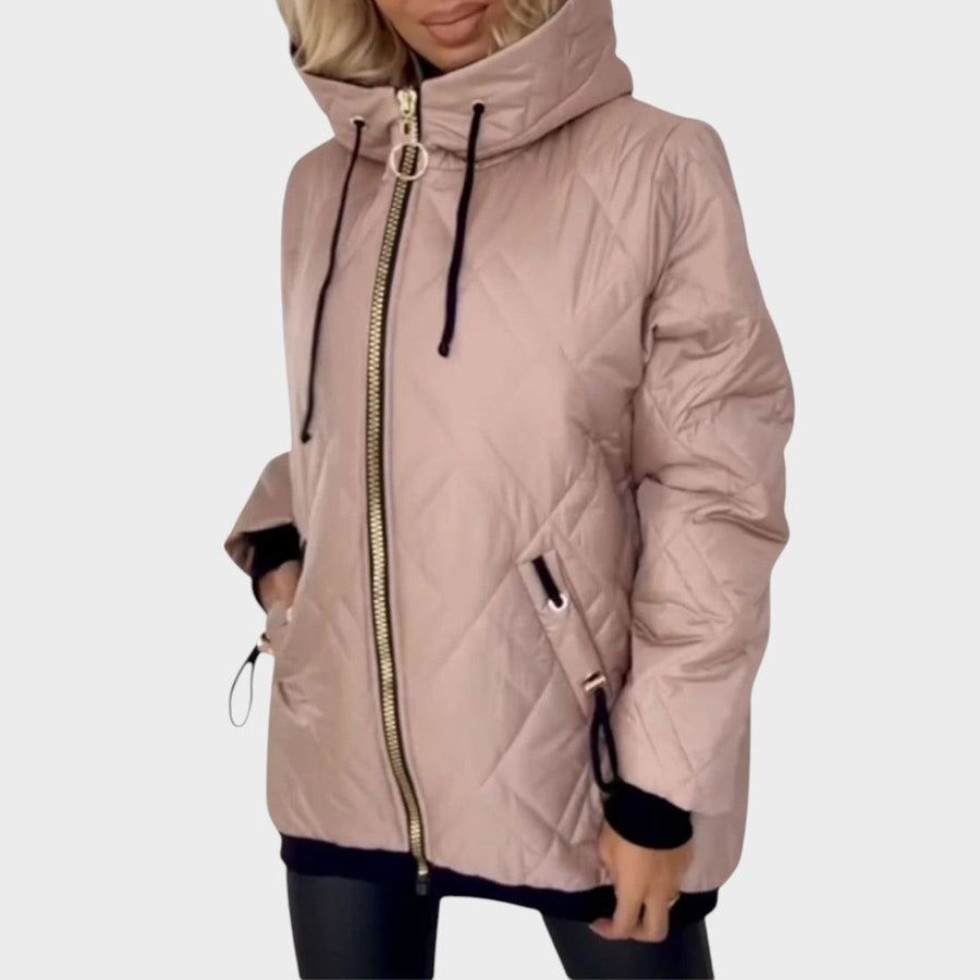 Marilyn™ quilted hooded zip front jacket by THE WHITMORE FAMILY, shown in a stylish, padded design with a front zipper and hood.