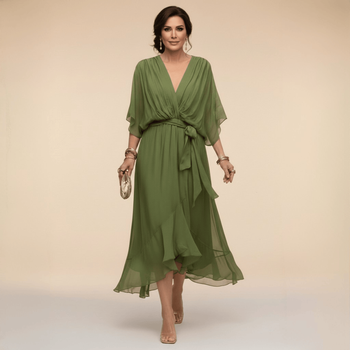 Mona V-Neck Dress by THE WHITMORE FAMILY, featuring a stylish V-neckline and elegant silhouette in a vibrant fabric.