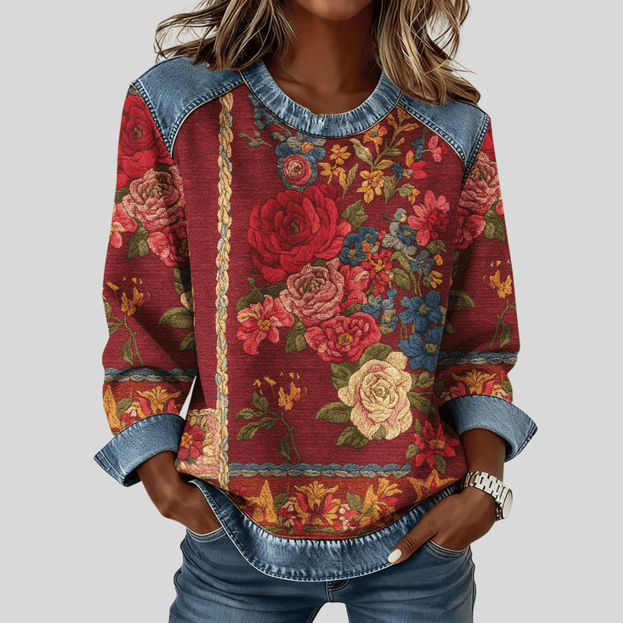 Junelle™ floral print sweatshirt by THE WHITMORE FAMILY, featuring colorful flower patterns on soft fabric.