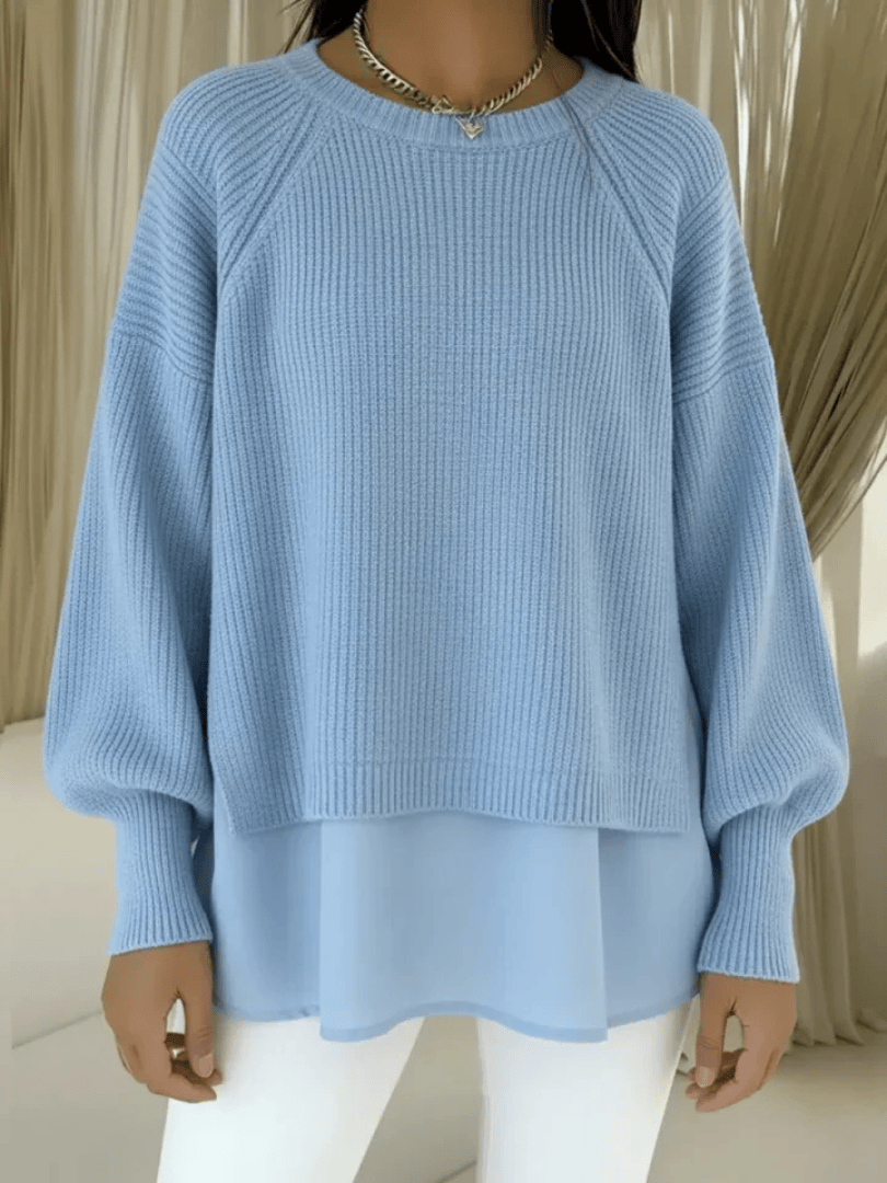 Kestlyn™ layered-look sweater from THE WHITMORE FAMILY featuring a stylish, cozy knit design and layered fabric details.