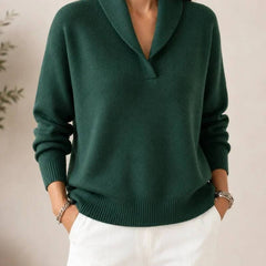 Soft V-neck women's sweater by THE WHITMORE FAMILY, featuring a cozy knit fabric and a stylish V-neck design.