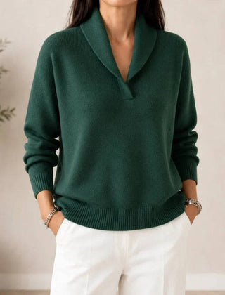 Soft V-neck women's sweater by THE WHITMORE FAMILY, featuring a cozy knit fabric and a stylish V-neck design.