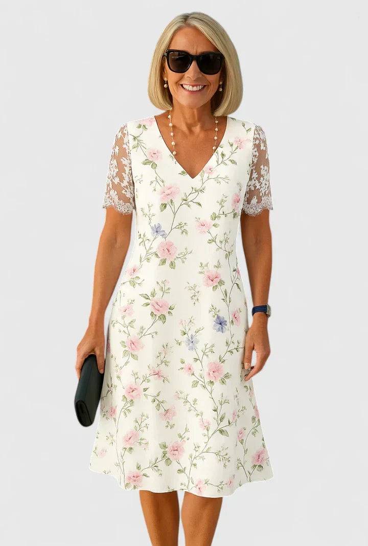 Elegant midi dress by THE WHITMORE FAMILY, featuring a flattering silhouette and stylish design, perfect for formal occasions.