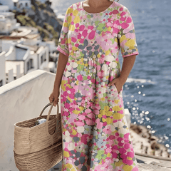 Elegant floral summer midi dress by THE WHITMORE FAMILY featuring a lightweight fabric and a flattering fit.