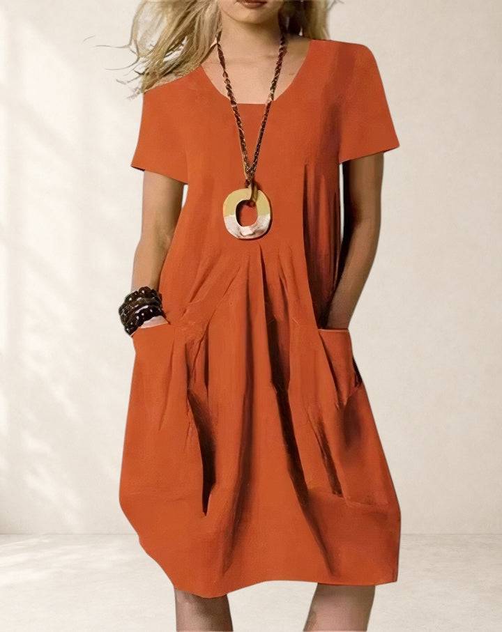 Alani Easy Casual Flow Midi Dress by THE WHITMORE FAMILY, featuring a relaxed fit, soft fabric, and stylish midi length.