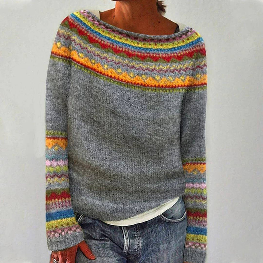 Charlotte retro Scandinavian knitted sweater by THE WHITMORE FAMILY, featuring colorful geometric patterns and cozy knit texture.