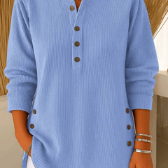 Button Henley sweater tunic for women by THE WHITMORE FAMILY, featuring a classic henley neckline and button details in cozy knit fabric.