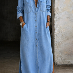 Andrea denim button-down dress by THE WHITMORE FAMILY, featuring a classic blue denim fabric and button-front design.