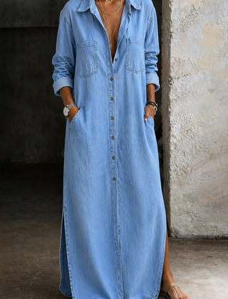 Andrea denim button-down dress by THE WHITMORE FAMILY, featuring a classic blue denim fabric and button-front design.