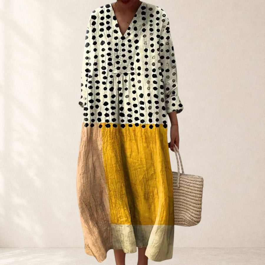 Stephanie™ geometric dress by THE WHITMORE FAMILY featuring bold patterns and a stylish, modern silhouette.