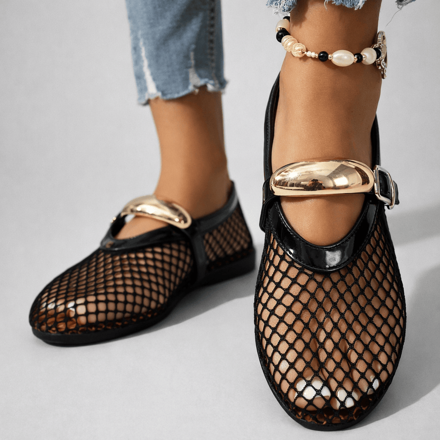 Arlena Mary Jane flats by THE WHITMORE FAMILY, black leather shoes with strap and rounded toe, stylish and comfortable footwear.
