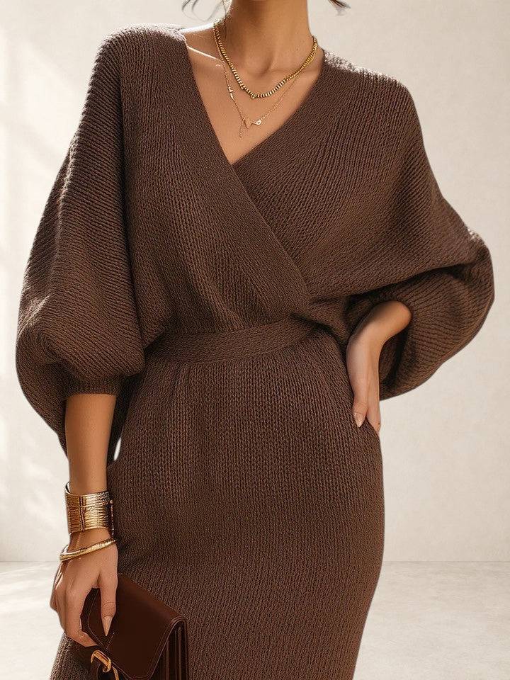 Fey comfortable dress by THE WHITMORE FAMILY, featuring a casual fit and soft fabric, displayed on a hanger.