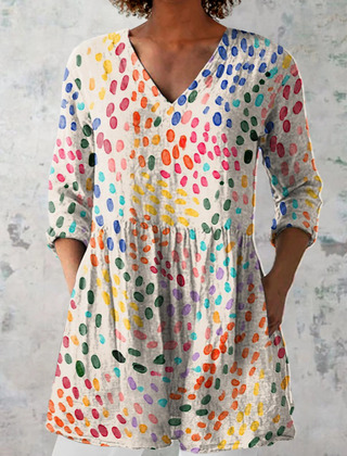 Pauline long blouse with V-neck by THE WHITMORE FAMILY, featuring lightweight fabric and stylish design perfect for casual wear.