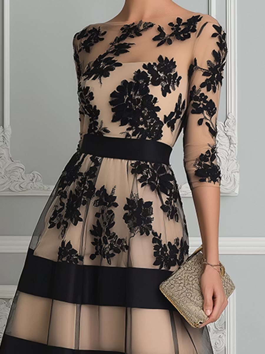 Elegant black lace midi A-line dress by THE WHITMORE FAMILY, featuring delicate lace details and a flattering midi silhouette.