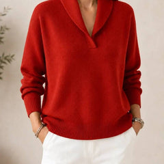 Soft V-neck women's sweater by THE WHITMORE FAMILY featuring a cozy knit fabric and a classic V-neck design.