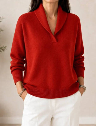 Soft V-neck women's sweater by THE WHITMORE FAMILY featuring a cozy knit fabric and a classic V-neck design.
