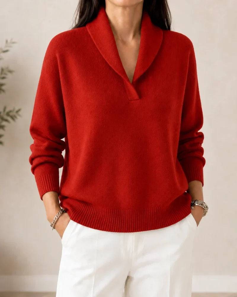 Soft V-neck women's sweater by THE WHITMORE FAMILY featuring a cozy knit fabric and a classic V-neck design.