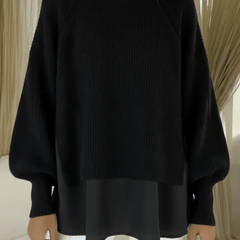 Layered-look women’s sweater by THE WHITMORE FAMILY, featuring a stylish, cozy jumper with a layered design.