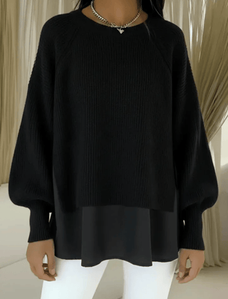 Layered-look women’s sweater by THE WHITMORE FAMILY, featuring a stylish, cozy jumper with a layered design.