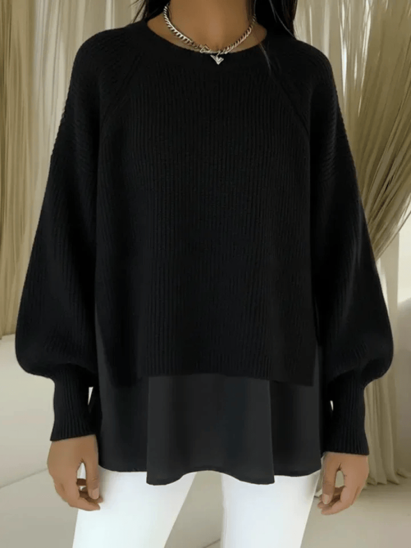 Layered-look women’s sweater by THE WHITMORE FAMILY, featuring a stylish, cozy jumper with a layered design.