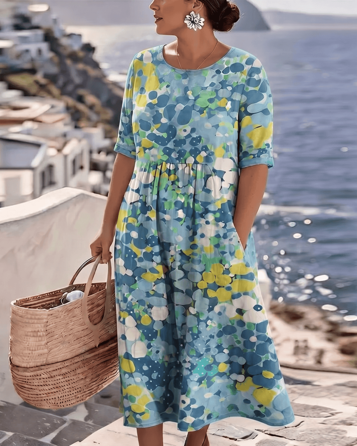 Elegant floral summer midi dress by THE WHITMORE FAMILY, featuring a flowing design and vibrant floral pattern.