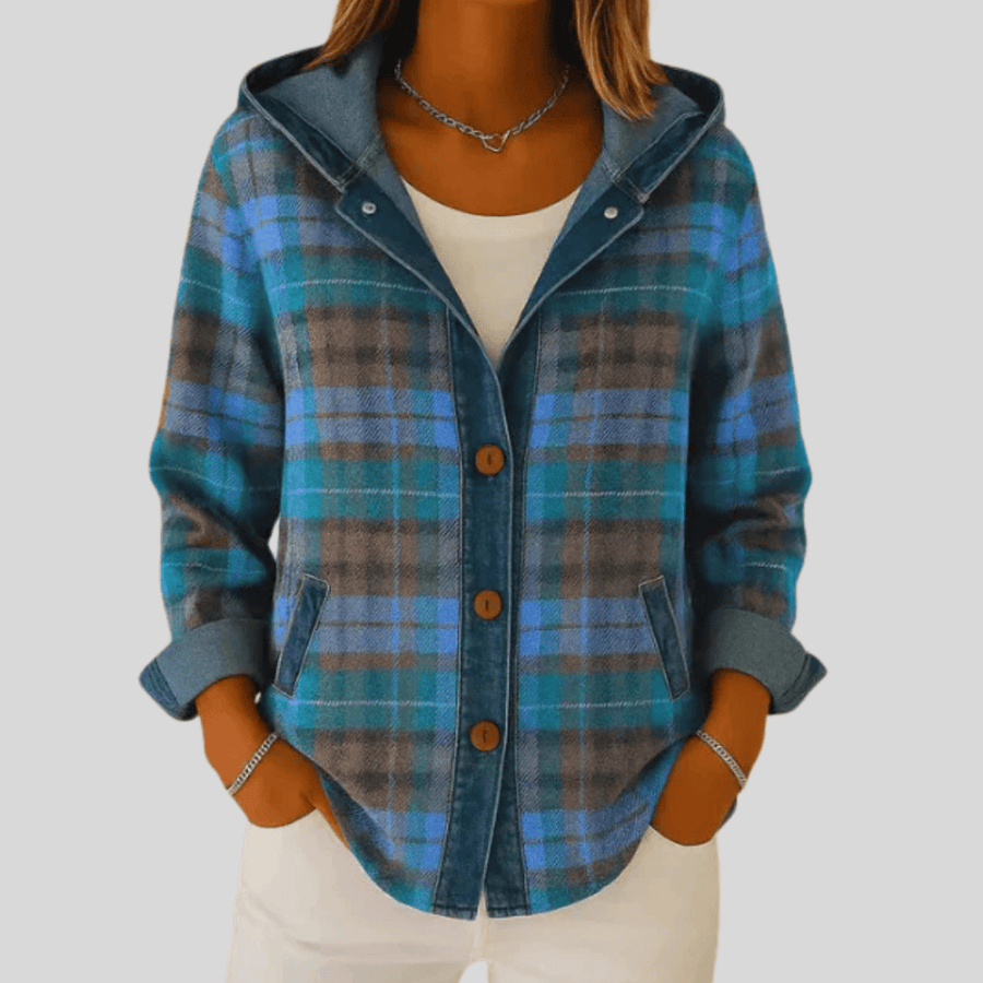 Hildred™ hooded plaid shacket from THE WHITMORE FAMILY, featuring a cozy plaid pattern and hooded design in a casual style.