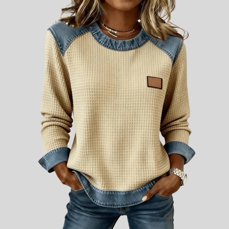 Delancine™ Patchwork Design Waffle Sweatshirt by THE WHITMORE FAMILY, featuring a cozy waffle knit with colorful patchwork pattern.