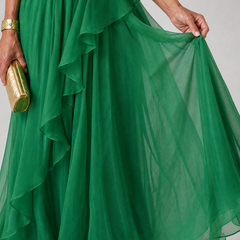 Talia cascading ruffle maxi dress by THE WHITMORE FAMILY, flowing fabric with layered ruffles and elegant design.