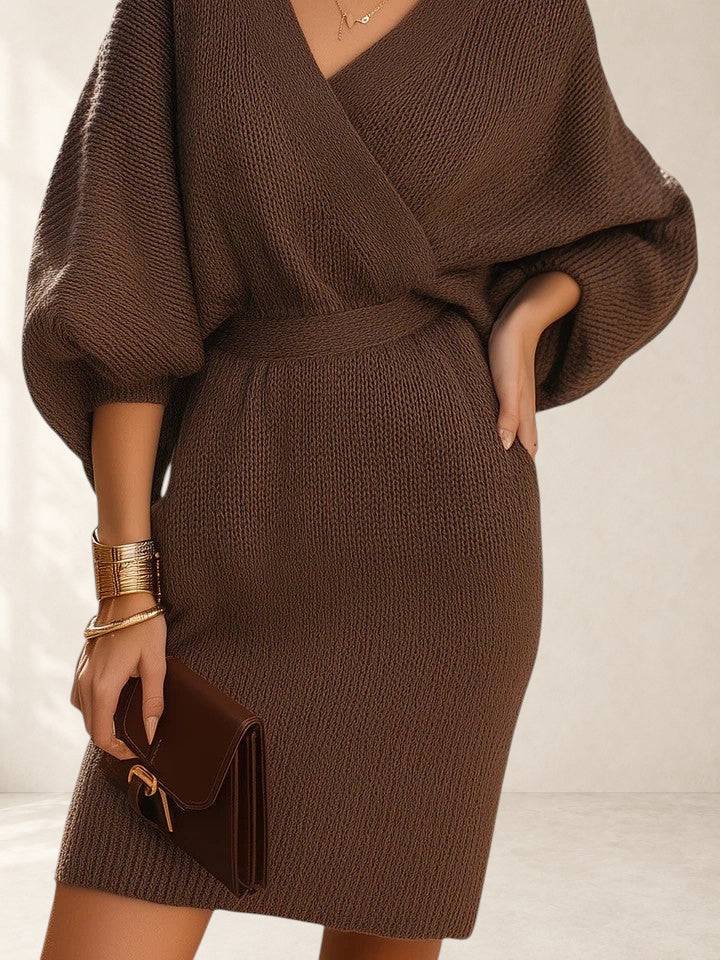 Fey comfortable dress by THE WHITMORE FAMILY, featuring a relaxed fit and stylish design, worn by a model outdoors.