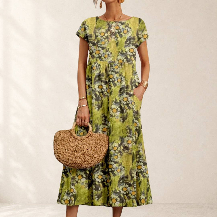 Valencia™ Chic Floral Dress by THE WHITMORE FAMILY featuring a stylish floral pattern and elegant design.