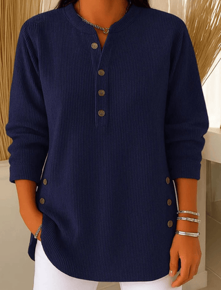 Button Henley sweater for women by THE WHITMORE FAMILY featuring a casual, long-sleeve tunic with button details and comfortable fit.