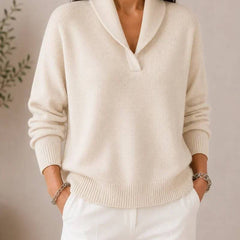 Soft V-neck women's sweater by THE WHITMORE FAMILY featuring a cozy knit design and a relaxed fit.
