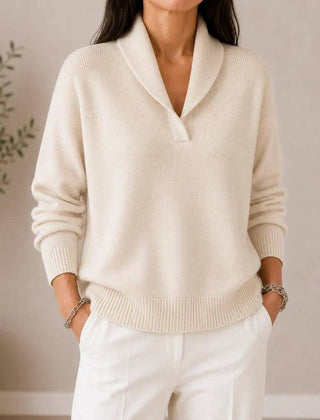 Soft V-neck women's sweater by THE WHITMORE FAMILY featuring a cozy knit design and a relaxed fit.