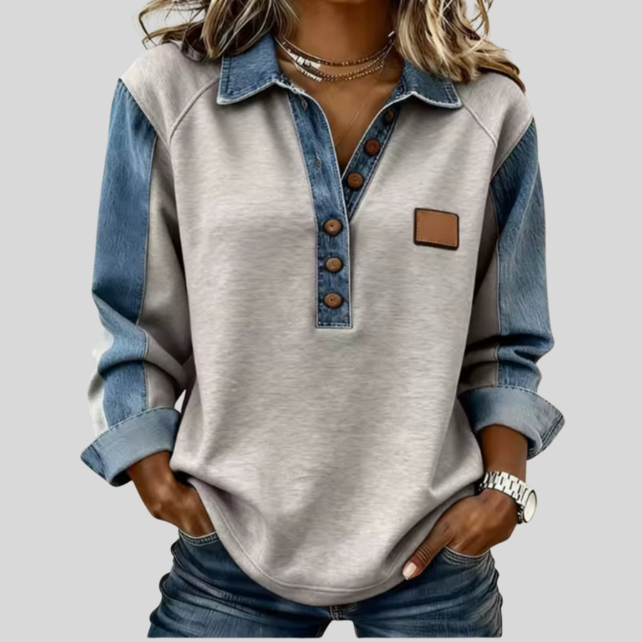 Voxanne™ denim collar pullover from THE WHITMORE FAMILY, shown in blue with a stylish denim collar and cozy knit fabric.