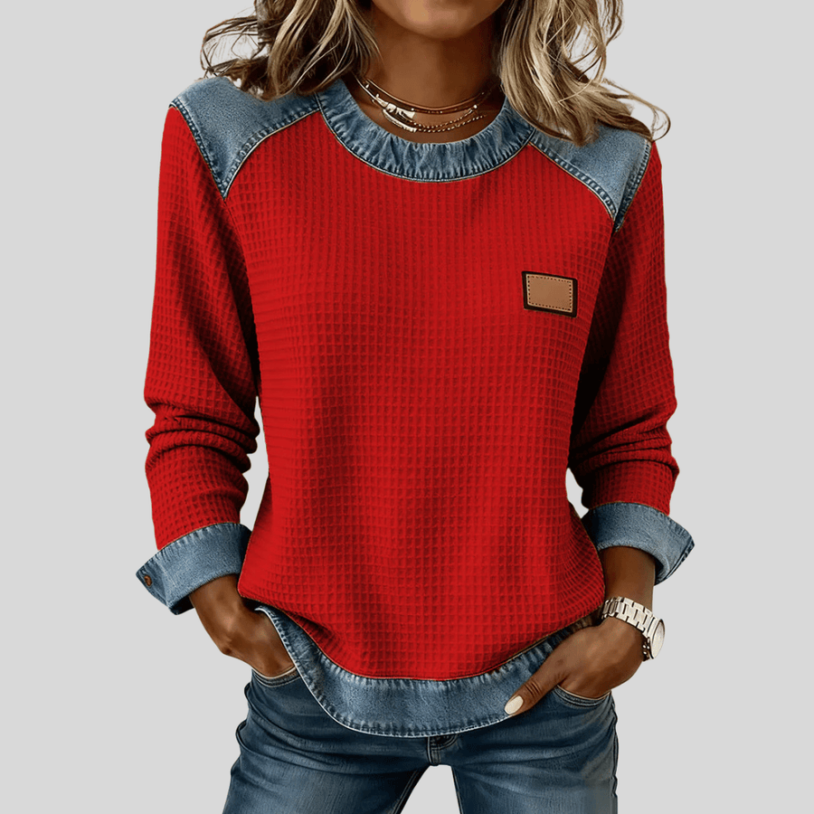 Delancine™ patchwork design waffle sweatshirt by THE WHITMORE FAMILY, featuring a cozy, textured fabric with colorful patchwork pattern.
