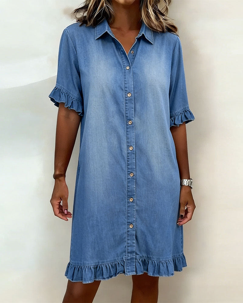 Maria denim dress by THE WHITMORE FAMILY featuring comfortable fit and flattering pleats, shown on a model in a casual setting.