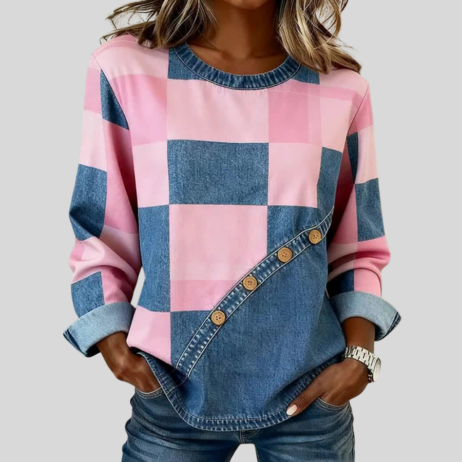 Tindelle™ Patchwork Art Sweatshirt by THE WHITMORE FAMILY featuring colorful patchwork design and comfortable fit.